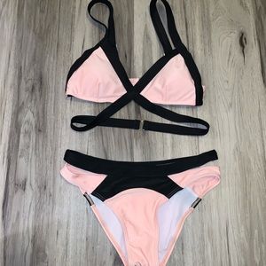 Strappy pink and black bikini
